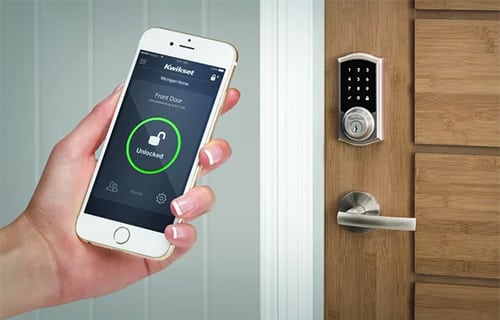 Kwikset Smart Lock being activated with a smartphone